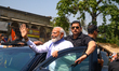 Indian Prime Minister Narendra Modi waved his hand to more than 10,000 people standing on...