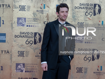 Josh O'Connor is attending the photocall at the 69th David Di Donatello at Cinecitta Studios in Rome, Italy, on May 3, 2024. (