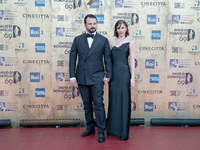 Edoardo De Angelis and his wife are attending the photocall at the 69th David Di Donatello at Cinecitta Studios in Rome, Italy, on May 3, 20...