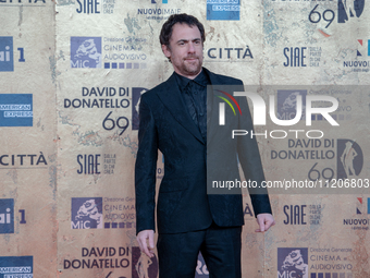 Elio Germano is attending the photocall at the 69th David Di Donatello at Cinecitta Studios in Rome, Italy, on May 3, 2024. (