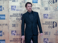 Elio Germano is attending the photocall at the 69th David Di Donatello at Cinecitta Studios in Rome, Italy, on May 3, 2024. (