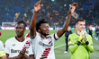 Edmond Tapsoba of Bayer 04 Leverkusen celebrates the victory with Odilon Kossounou after t...
