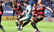 Callum O'Hare of Coventry City is being challenged by Sam Field from Queens Park Rangers d...