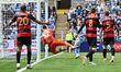 Joe Walsh (35, Queens Park Rangers) is unable to stop Jamie Allen's (8, Coventry City) hea...