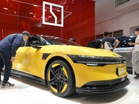 Visitors are looking at the ZEEKR 007 electric car at the 2024 Beijing International Automotive Exhibition in Beijing, China, on May 3, 2024...