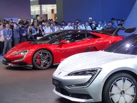 Spectators are looking at the U7 and U9 electric cars at the 2024 Beijing International Automotive Exhibition in Beijing, China, on May 3, 2...