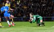Goalkeeper Jamie Cumming of Oxford United is scooping the ball during the Sky Bet League 1...
