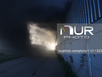 Smoke is rising into the sky during a fire following a Russian missile strike in Kharkiv, northeastern Ukraine, on May 4, 2024. NO USE RUSSI...