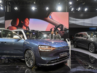 Visitors are exploring the exhibition area of AITO at the 21st Anhui International Automobile Exhibition in Hefei, Anhui Province, China, on...