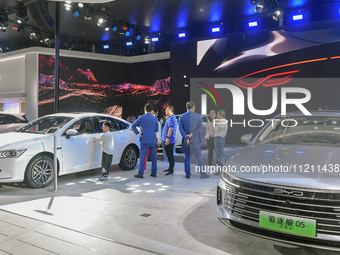 Visitors are viewing the BYD Auto exhibition area at the 21st Anhui International Automobile Exhibition in Hefei, China, on May 3, 2024. (