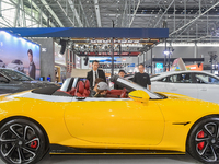Visitors are viewing the MG car exhibition area at the 21st Anhui International Automobile Exhibition in Hefei, Anhui Province, China, on Ma...