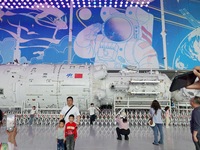 Visitors are visiting the Tianhe Core Module at the China Science and Technology Museum in Beijing, China, on May 4, 2024. (