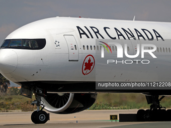 An Air Canada Boeing 777-333(ER) is preparing to take off on the runway at Barcelona-El Prat Airport in Barcelona, Spain, on May 1, 2024. (