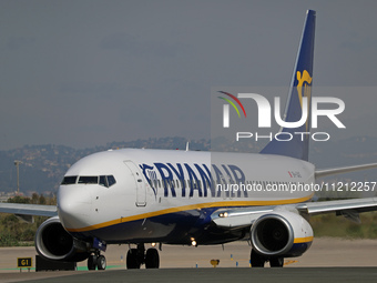 A Boeing 737-8AS belonging to Ryanair is preparing to take off on the runway at Barcelona-El Prat Airport in Barcelona, Spain, on May 1, 202...