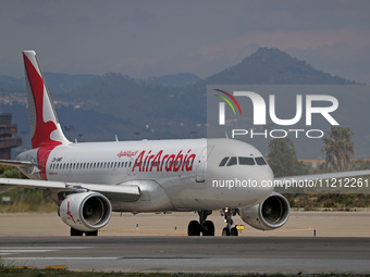 An Airbus A320-214 belonging to Air Arabia is preparing to take off on the runway at Barcelona-El Prat Airport in Barcelona, Spain, on May 1...