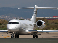 A Bombardier Global Express of FAI-Rent-a-Jet Airlines is preparing to take off on the runway at Barcelona-El Prat Airport in Barcelona, Spa...