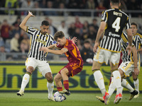 Luiz Da Silva Danilo of Juventus FC is competing for the ball with Tommaso Baldanzi of A.S. Roma during the Serie A TIM match between AS Rom...