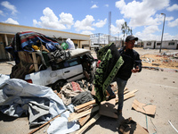Displaced Palestinians are setting up shelter in Khan Yunis after leaving with their belongings from Rafah in the southern Gaza Strip, follo...