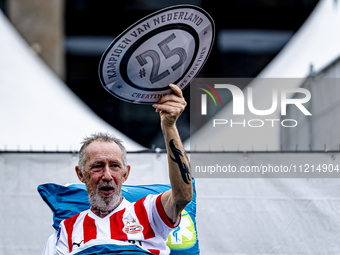 Supporters are gathering at Stadhuisplein during the tribute to PSV for their championship season 2023-2024 in Eindhoven, Netherlands, on Ma...