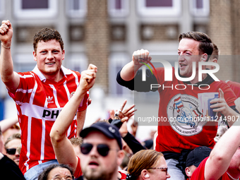 Supporters are gathering at Stadhuisplein during the tribute to PSV for their championship season 2023-2024 in Eindhoven, Netherlands, on Ma...