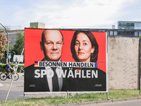The Social Democratic Party of Germany (SPD) is displaying an election campaign poster featuring Federal Chancellor Olaf Scholz and SPD Euro...