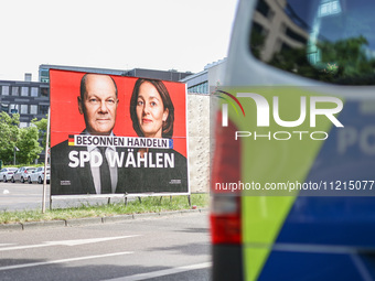 The Social Democratic Party of Germany (SPD) is displaying an election campaign poster featuring Federal Chancellor Olaf Scholz and SPD Euro...