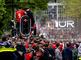 Supporters are gathering on the Stadhuisplein during the tribute to PSV for their championship season 2023-2024 in Eindhoven, Netherlands, o...