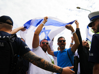 Participants of the March of the Living are reacting to a pro-Palestinian protest in Oswiecim, Poland, on May 6, 2024. The March of the Livi...