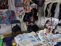 People are selling garments at the Apapacho Fair in Mexico City, Mexico, at the National Museum of Popular Cultures on the eve of Mother's D...