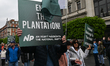 DUBLIN, IRELAND - MAY 6:Protester hold placards while thousands gathered in Dublin city c...