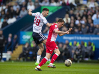 Collins #28 of Bolton Wanderers is tackling the opponent during the Sky Bet League 1 Play-Off Semi-Final 2nd leg between Bolton Wanderers an...