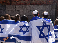 Young Jews stand in front of the Death Wall on the 36th anniversary of 'International March of the Living' at the former Nazi-German Auschwi...