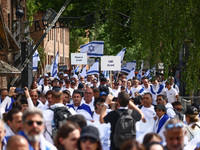Participants attend the 36th anniversary of 'International March of the Living' marching from the former Nazi-German Auschwitz Birkenau conc...