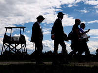 Participants attend the 36th anniversary of 'International March of the Living' marching at  the former Nazi-German Auschwitz Birkenau conce...