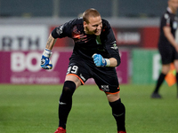 Nemanja Andrijanic, the goalkeeper of Floriana, is reacting in celebration after scoring the decisive penalty kick in the penalty shootout f...