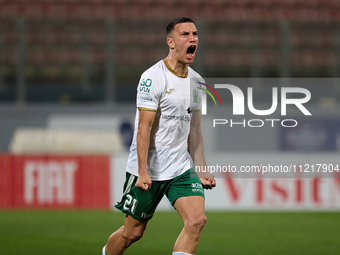 Carlo Zammit Lonardelli of Floriana is reacting in celebration after scoring his penalty kick during a penalty shoot-out from the IZIBET FA...