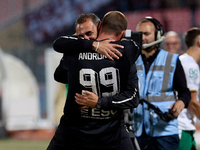 Nemanja Andrijanic, the goalkeeper of Floriana, is celebrating with his goalkeepers coach Simon Grech after scoring the decisive penalty kic...