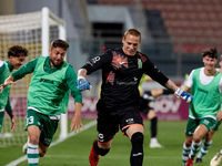 Nemanja Andrijanic, the goalkeeper of Floriana, is celebrating after scoring the decisive penalty kick in the penalty shootout from the IZIB...