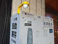 A ''Smart Depository'' self-service depository is situated near the first floor entrance of Shanghai Tower in Shanghai, China, on May 7, 202...