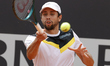 Daniel Elahi Galan of Colombia is playing against Zhizhen Zhang of China during the first...