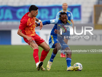 Geoffrey Edwin Acheampong (R) of Sliema Wanderers is being closely followed by Neil Micallef (L) of Birkirkara during the IZIBET FA Trophy s...