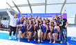 Members of Ethnikos OFPF Gold Force are celebrating their victory with the women's water p...