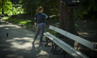 Woman is seen feeding birds after a bird flys away from her hand in Warsaw, Poland on 13 M...