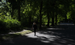 An elderly person is seen walking in a park in Warsaw, Poland on 13 May, 2204. 