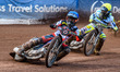Ben Cook of Belle Vue Aces, in blue, is leading Craig Cook of Oxford Spires, in yellow, du...