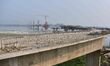 A view is showing the under-construction Guwahati-North Guwahati Bridge across the Brahmap...