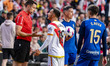 Alvaro Garcia of Rayo Vallecano is arguing with the referee during the La Liga EA Sports 2...