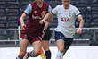 Emma Harries of West Ham United WFC and Bethany England of Tottenham Hotspur Women are in...