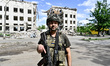 A fighter of the 53rd Battalion of the 141st Separate Infantry Brigade is serving in the Z...