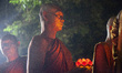 Buddhist monks are performing the Pradaksina procession during the commemoration of Vesak...